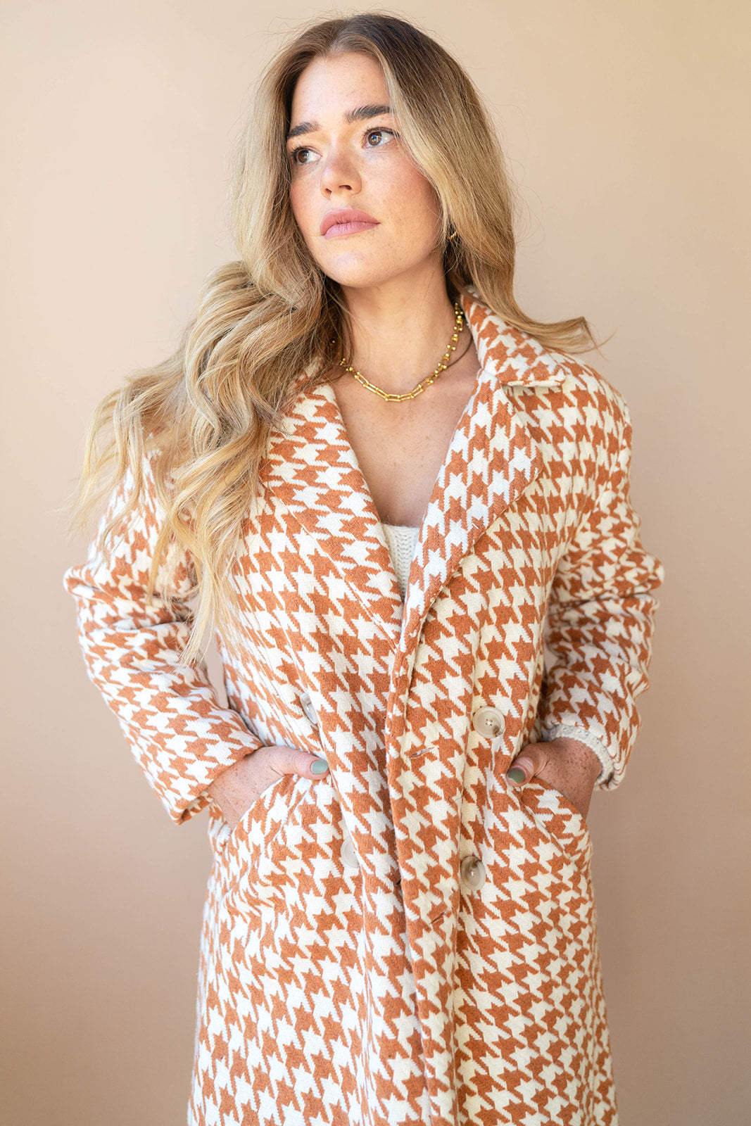 elegant houndstooth coat